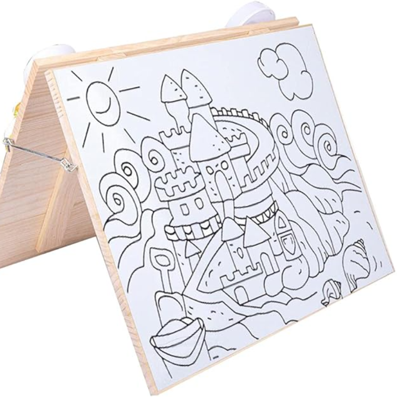 Coloring book with a castle design on a wooden stand against a white background